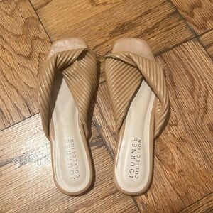 Barely worn tan slip on sandals